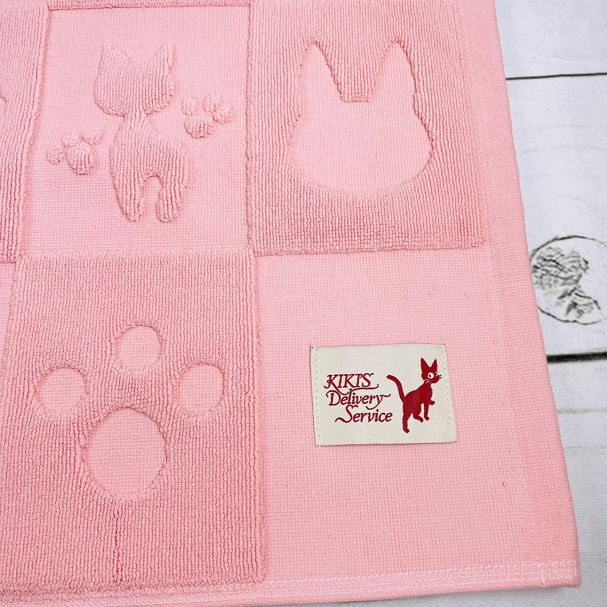 Kiki's delivery cotton bath mat