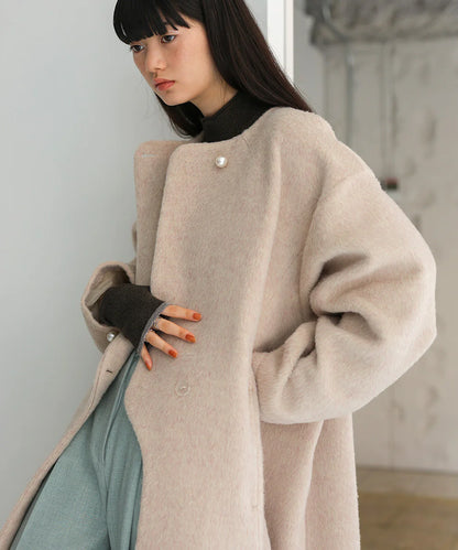 SHAGGY PEARL BUTTON OVER SILHOUETTE COAT