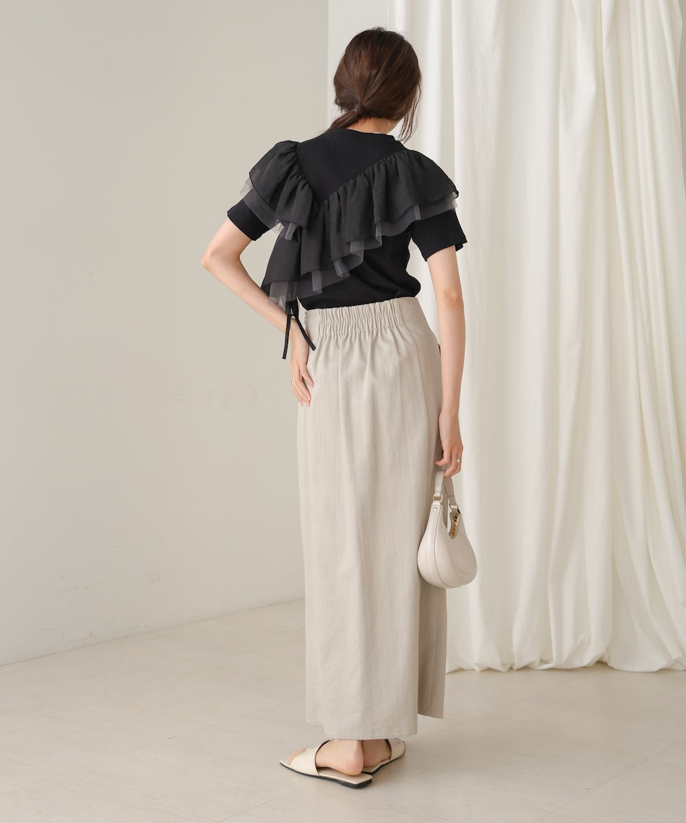 Asymmetric frill docking cut and sew